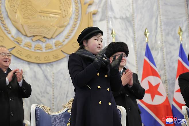 North Korean leader Kim Jong-un’s daughter, Kim Ju-ae, appears at a nighttime military parade at Kim Il Sung Square on Wednesday to mark the 75th anniversary of the founding of the Korean People’s Army in Pyongyang, in this photo released by the state-run Korean Central News Agency on Thursday. (Yonhap)