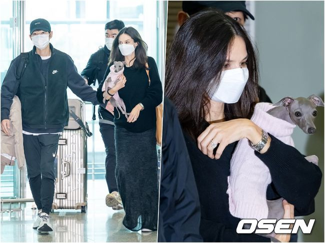 [OSEN=인천공항, 민경훈 기자] 배우 송중기가 부인 케이티 루이스 사운더스와 함께 16일 넷플릭스 영화 '로기완' 해외 로케이션 촬영차 인천국제공항을 통해 출국했다.배우 송중기와 부인 케이티가 출국장으로 이동하고 있다. 2023.02.16 / rumi@osen.co.kr