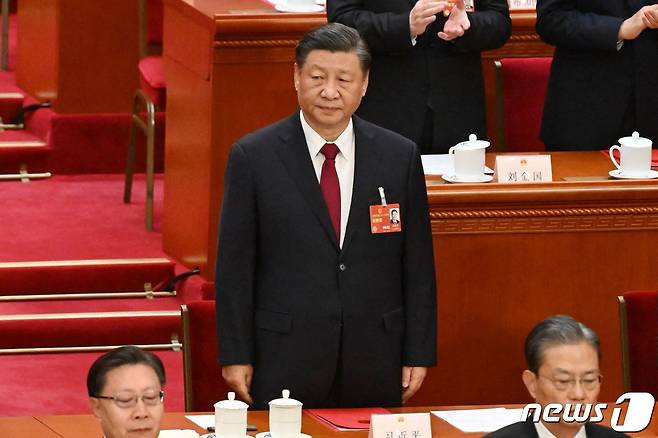시진핑 중국 국가 주석이 13일 (현지시간) 베이징 인민 대회당에서 열린 전인대 폐막식에 참석을 하기 위해 도착을 하고 있다. ⓒ AFP=뉴스1 ⓒ News1 우동명 기자