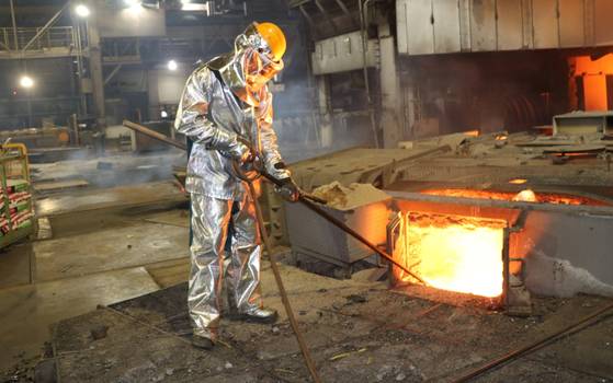 A Posco employee works at the Pohang steel plant. [POSCO]