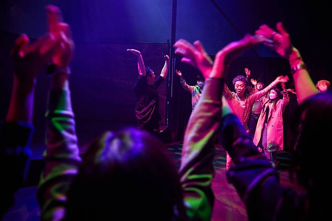 The audience dances along in the participatory show “Beyond Diverse Dimensions.” (LG Arts Center)