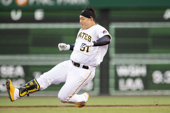 Pittsburgh Pirates designated hitter Choi Ji-man slides into second base after hitting a double against the Houston Astros during the first inning at PNC Park on April 11.  [USA TODAY/YONHAP]