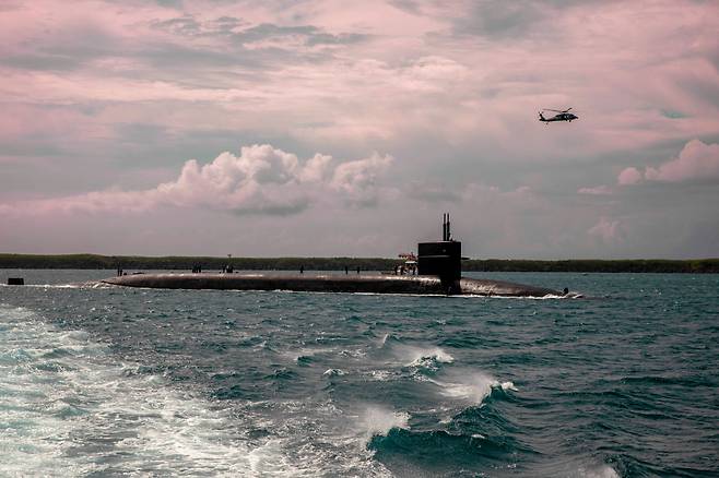 The Ohio-class nuclear-powered ballistic-missile submarine USS Maine (SSBN 741) conducts a logistics stop at Naval Base Guam in April. (Photo - US Pacific Fleet)