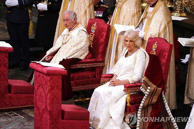 대관식 속 찰스 3세 영국 국왕과 커밀라 왕비  [AFP=연합뉴스. 재판매 및 DB 금지]