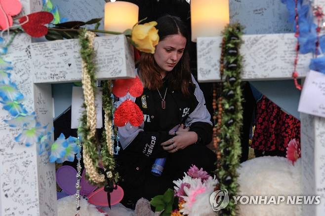 텍사스 총격을 애도하는 시민들  [AFP 연합뉴스 자료사진. 재판매 및 DB 금지]