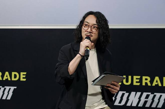 정우용 하이브IM 대표가 15일 용산 CGV에서 열린 미드낫 디지털싱글 기자간담회에서 기자들의 질문에 답하고 있다. (사진=하이브)