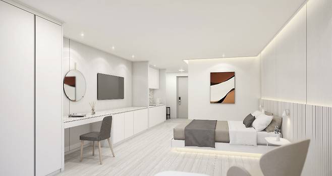 롯데건설의 커뮤니티 인테리어 스타일 ‘살롱 드 캐슬(Salon de CASTLE)’의 호텔 스타일 게스트룸 콘셉트 이미지. [롯데건설 제공]