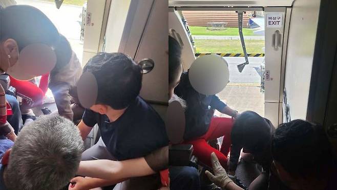 26일 오전 제주공항을 출발해 대구공항으로 향하던 아시아나 항공기에서 비행 중 문이 열리는 사고가 발생했다. 사진 속 '빨간바지 승객' 등은 항공기 문을 연 승객 제압을 도운 것으로 알려졌다. /뉴스1