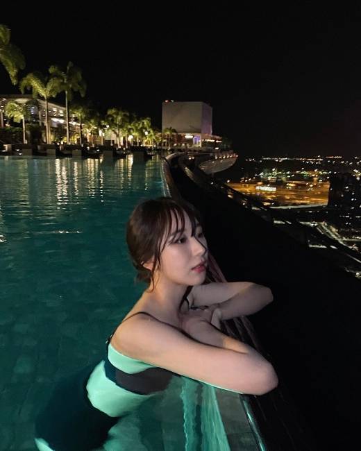 Singer Lee Chae-yeon recalled her summer vacation last year.Lee Chae-yeon wrote on July 17, The real summer is approaching. Singapores night was beautiful. Lee Chae-yeon, who enjoys leisure time in a hotel pool overlooking the city center, was included in the photo.Lee Chae-yeons beauty, as beautiful as Singapores night, attracts attention.Meanwhile, Lee Chae-yeon released her second mini album Over The Moon in April.