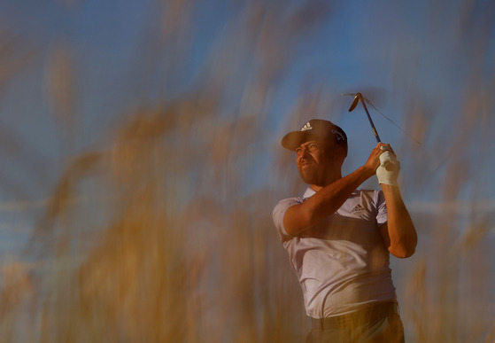 Xander Schauffele of the United States plays his second shot on the 18th hole during Day Three of the Genesis Scottish Open at The Renaissance Club on July 9, 2022 in North Berwick, Scotland.  [GETTY IMAGES]