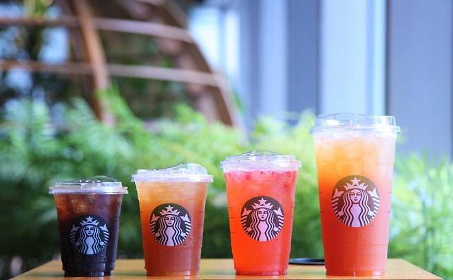 Starbucks Korea, which opened its first store in 1999, is celebrating its 24th anniversary by releasing the "trenta" size for three summer beverages. From left: tall, grande, venti, trenta. (Starbucks Korea)