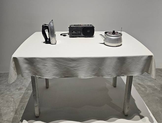 "An Iron in the Form of a Radio, a Kettle in the Form of an Iron, and a Radio in the Form of a Kettle" by Kim Beom at the exhibition, "How to become a rock" (Park Yuna/The Korea Herald)