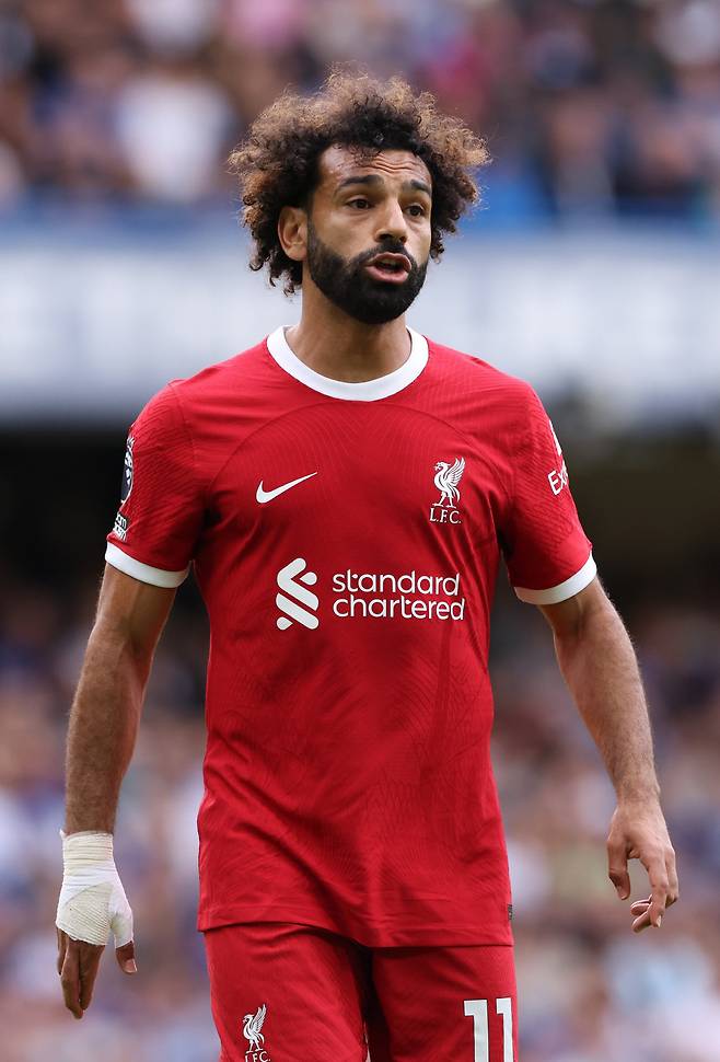 epa10798843 Liverpool's Mohamed Salah reacts during the English Premier League match between Chelsea FC and Liverpool FC in London, Britain, 13 August 2023.  EPA/NEIL HALL EDITORIAL USE ONLY. No use with unauthorized audio, video, data, fixture lists, club/league logos or 'live' services. Online in-match use limited to 120 images, no video emulation. No use in betting, games or single club/league/player publications