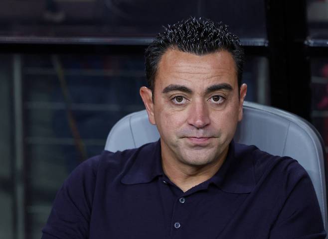 LAS VEGAS, NEVADA - AUGUST 01: Manager Xavier "Xavi" Hernandez Creus of FC Barcelona looks on before a preseason friendly match against AC Milan during the 2023 Soccer Champions Tour at Allegiant Stadium on August 01, 2023 in Las Vegas, Nevada. FC Barcelona defeated AC Milan 1-0.   Ethan Miller/Getty Images/AFP (Photo by Ethan Miller / GETTY IMAGES NORTH AMERICA / Getty Images via AFP)