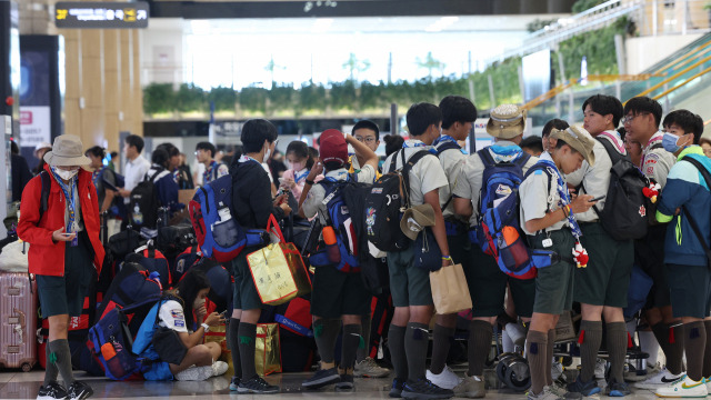 ▲본국으로 출국하는 세계스카우트 대만 잼버리 대원들이 13일 오후 서울 강서구 김포공항에서 출국 준비를 하고 있다. ⓒ연합뉴스