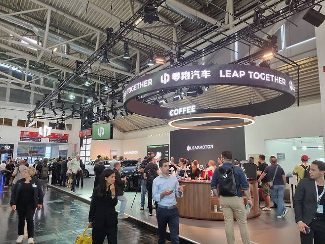 People visit Leapmotor's exhibition booth at IAA Mobility in Munich on Monday. (Kan Hyeong-woo/The Korea Herald)