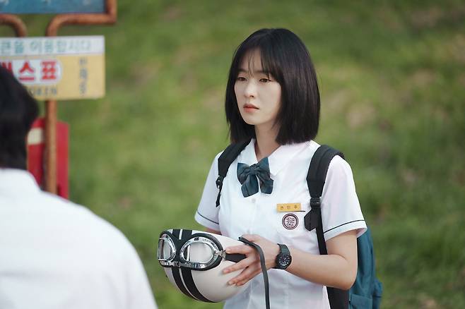 Jeon Yeo-been plays the role of both Kwon Min-ju, a high school student, and Han Jun-hee, a career woman in her 30s, in "A Time Called You." (Netflix)