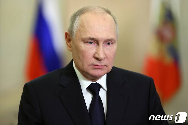 블라디미르 푸틴 러시아 대통령이 30일(현지시간) 공개된 대국민 영상 메시지를 통해 우크라이나 내 점령지 4곳(도네츠크·루한스크·헤르손·자포리자) 병합 1주년 연설을 하고 있다. 2023.09.30/뉴스1 ⓒ 로이터=뉴스1 ⓒ News1 김민수 기자