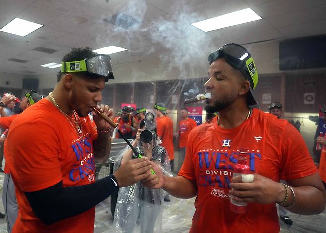 Oct 1, 2023; Phoenix, Arizona, USA; Houston Astros relief pitcher Bryan Abreu (52) and Houston Astros first baseman Jose Abreu (79) celebrate after clinching the American League west division with their victory over the Arizona Diamondbacks at Chase Field. Mandatory Credit: Joe Camporeale-USA TODAY Sports