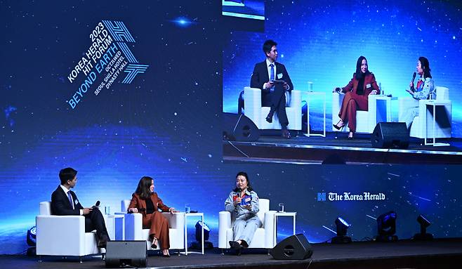 Sasha Sagan (center) and Yi Soyeon (right) speak in a panel discussion during The 2023 Korea Herald Humanity In Tech forum held at the Shilla Seoul on Wednesday. (The Korea Herald/Im Se-jun)