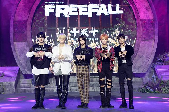 Tomorrow X Together poses for picture during a press event for its third LP, "The Name Chapter: Freefall," at Seoul's Kyung Hee University Grand Peace Palace on Thursday. (Big Hit Music)