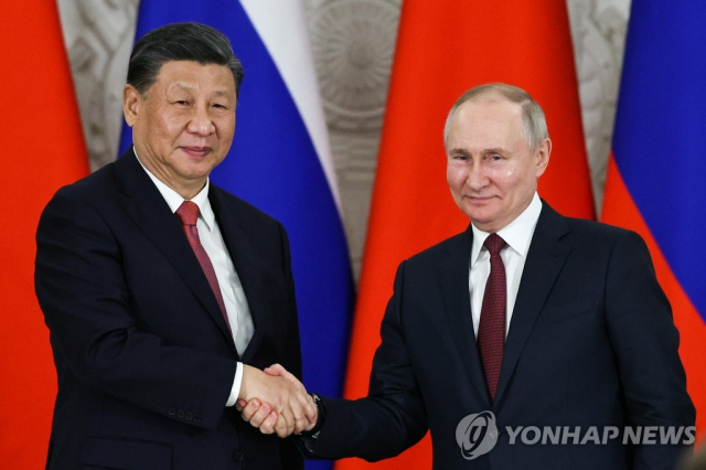 시진핑(왼쪽) 중국 국가주석과 블라디미르 푸틴 러시아 대통령. 연합뉴스