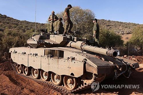 레바논 국경지대에 배치된 이스라엘 탱크 [AFP 연합뉴스 자료사진. 재판매 및 DB 금지]