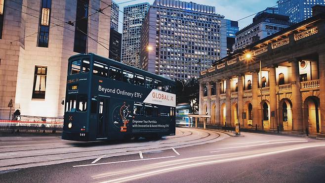 A Hong Kong tram wrapped with an ad for Mirae Asset's Global X ETFs (Mirae Asset Global Investments)