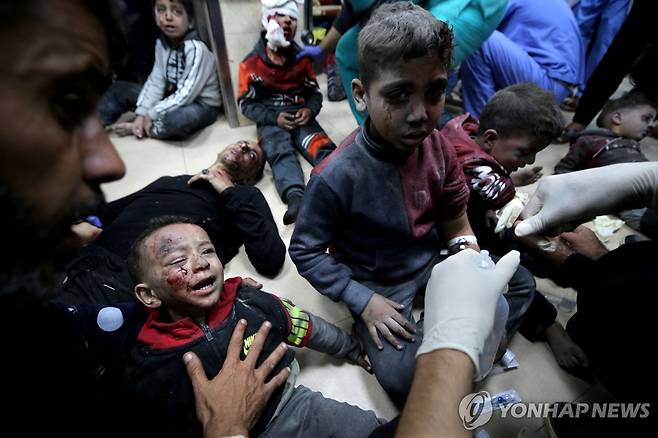 이스라엘 폭격에 신음하는 사자지구 주민들 [AFP 연합뉴스 자료사진. 재판매 및 DB 금지]