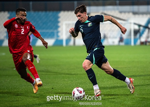 ABU DHABI, UNITED ARAB EMIRATES - JANUARY 6: Australia's Jordan Jacob Bos runs with the ball in the international friendly against Bahrain on January 6, 2024 in Abu Dhabi, United Arab Emirates. (Photo by Martin Dokoupil/Getty Images)