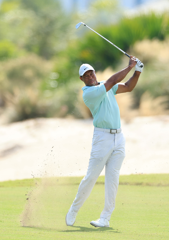 Tiger Woods plays his second shot on the third hole during the third round of the Hero World Challenge at Albany Golf Course in Nassau, the Bahamas on Dec. 2, 2023.  [GETTY IMAGES]