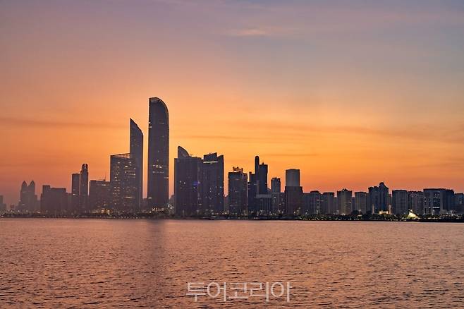 Abu Dhabi skyline at sunset