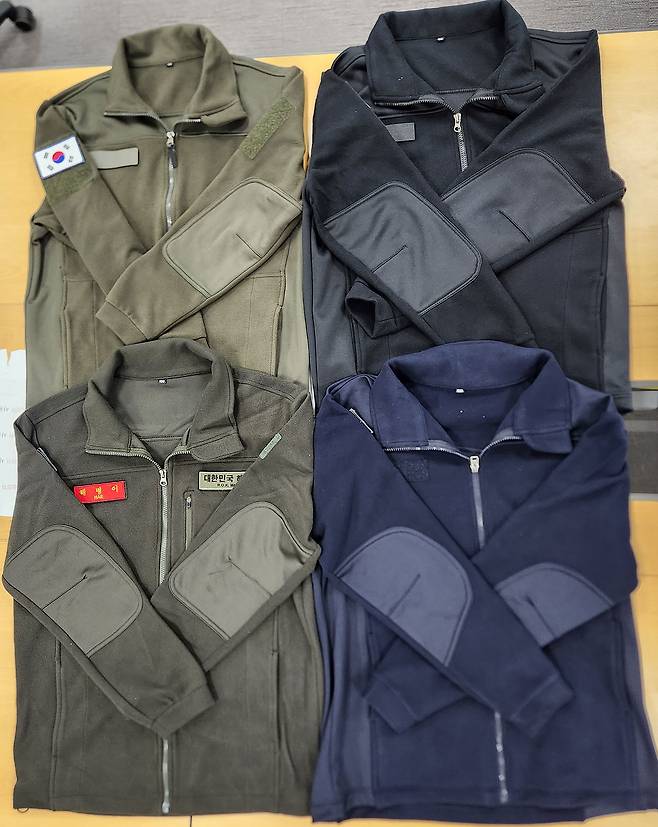 왼쪽 상단부터 시계방향으로 육군, 해군, 공군, 해병대 병사에게 지급되는 플리스형 재킷. [연합뉴스 제공]