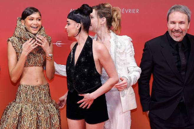 (LtoR) US actress Zendaya, Swiss actress Souheila Yacoub, Swedish actress Rebecca Ferguson and Canadian director Denis Villeneuve pose for a photocall during the preview screening event for the film "Dune: Part Two" at the Le Grand Rex Paris cinema in Paris on February 12, 2024. (Photo by Geoffroy VAN DER HASSELT / AFP)