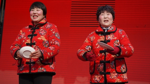 Villagers perform at the Chinese New Year party.