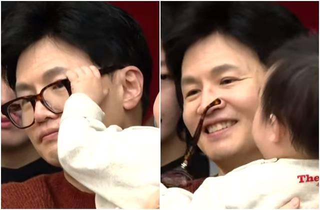 지난 5일 충북 청주에서 열린 '육아맘들과의 간담회'에서 한동훈 국민의힘 비상대책위원장이 안고 있던 아기가 한 위원장의 안경을 벗기고 있다. 유튜브 채널 '국민의힘TV' 영상 캡처