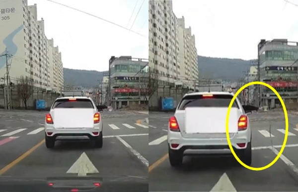 달리다 정차한 차량 탑승자가 도로 위에 컵라면 국물을 버리는 모습. /사진=보배드림 캡처