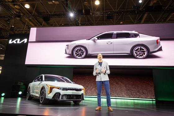Karim Habib, head of Kia Global Design, introduces Kia’s K4 compact sedan at the 2024 New York International Auto Show on Wednesday. [HYUNDAI MOTOR GROUP]