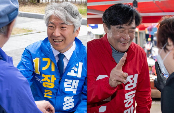2일 더불어민주당 최택용(왼쪽) 기장 후보와 국민의힘 정동만 기장 후보가 시민에게 지지를 호소하고 있다.  이원준 기자 windstorm@kookje.co.kr