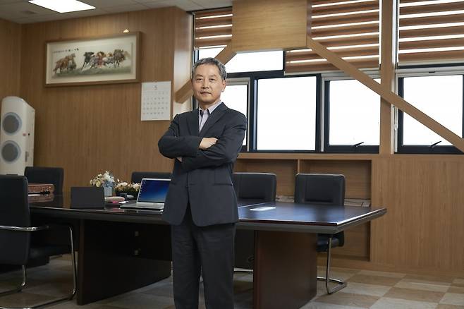 장상욱 제이앤티씨 회장. 사진=이미경 기자