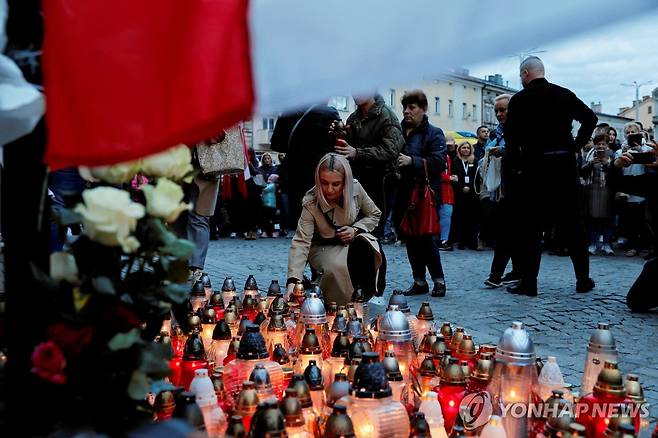 폴란드에서 열린 오폭 희생자 추모집회 [로이터 연합뉴스 자료사진. 재판매 및 DB 금지]