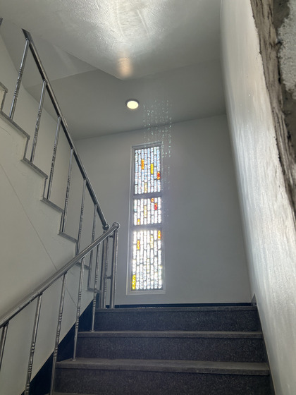 Stained-glass windows by Lee Kyou-hong in the staircase of his studio in Ganghwa Island, Incheon [SHIN MIN-HEE]