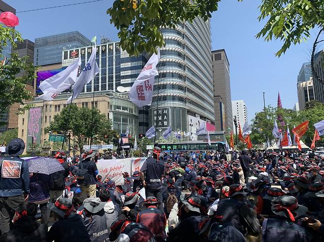 Members of the Korean Confederation of Trade Unions take part in a rally near Gwanghwamun Square in Seoul on May 1, 2023, as part of activities to commemorate Labor Day, also known as International Workers' Day. (No Kyung-min/ The Korea Herald)