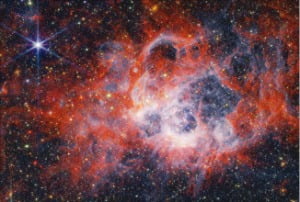 우리은하에서 가까운 외계 은하인 ‘NGC604’에서 별 200여 개가 생성되고 있는 모습. /사진=NASA