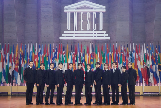 Boy band Seventeen gives a speech at the 13th Unesco Youth Forum in Paris in November 2023. [PLEDIS ENTERTAINMENT]