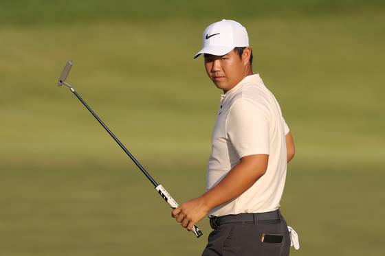 Tom Kim reacts on the 18th green during the first round of the 2024 PGA Championship at Valhalla Golf Club in Louisville, Kentucky on Thursday. [GETTY IMAGES]