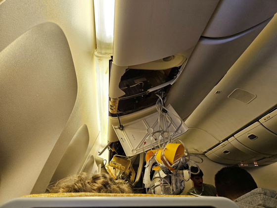 The interior of Singapore Airlines flight SQ321 is pictured after an emergency landing at Bangkok's Suvarnabhumi International Airport on Tuesday. [REUTERS]
