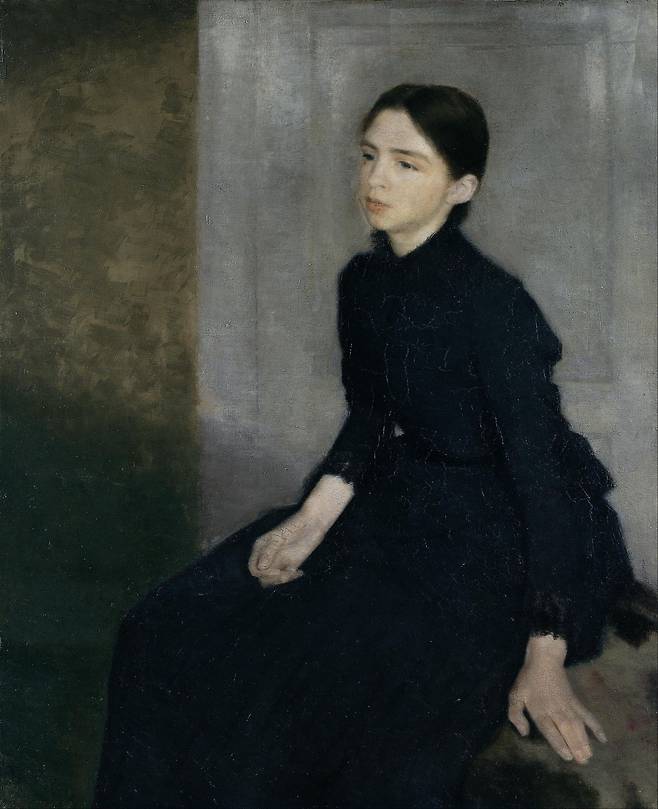 Portrait of a young woman. The artist's sister Anna Hammershøi(1885). /The Hirschsprung Collection