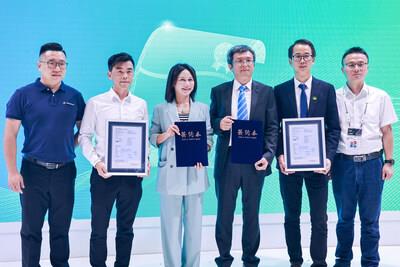 Haiyan Huang (middle), EVP&CSO at Astronergy,  received certificate from TUV Rheinlands at SNEC on June 13.