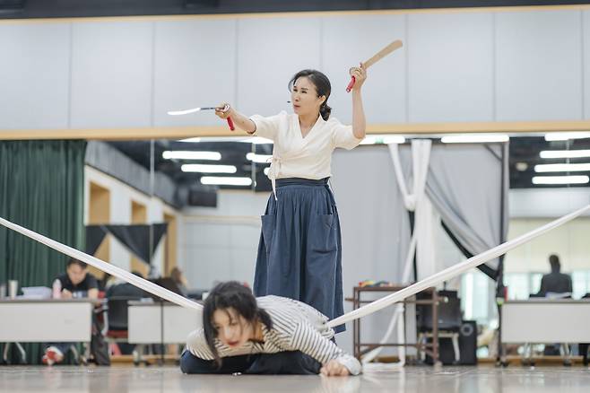 Members of the National Changgeuk Company of Korea rehearse "Paper Shaman." (National Theater of Korea)